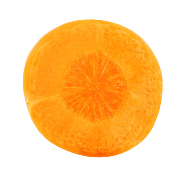 istock Carrot slice. Top view of carrot isolated on white. 1057773188