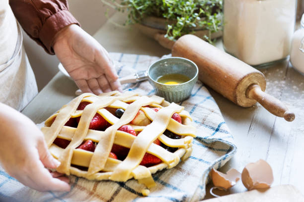 istock A person baking fruit pie food photography recipe idea 1057776336