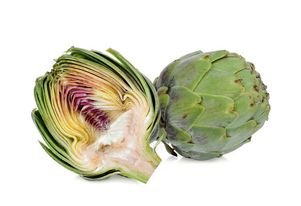 istock whole and half artichoke isolated on white background 1057783170