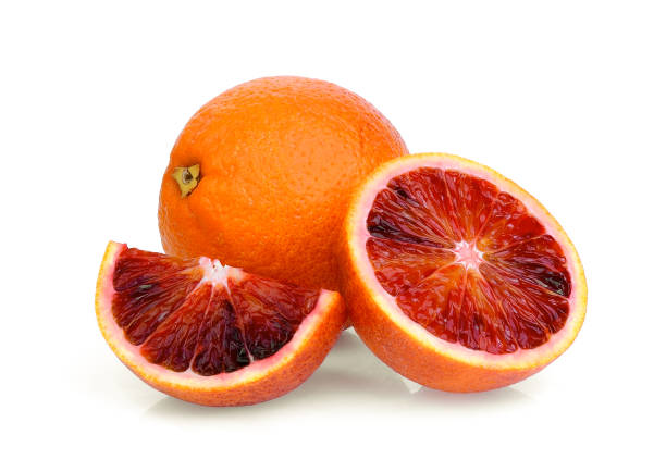 istock whole and half with slice blood orange isolated on white background 1057784532