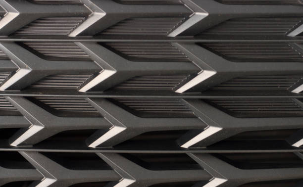 istock Black radiator grille. Grid of car close-up, texture, background 1057784552