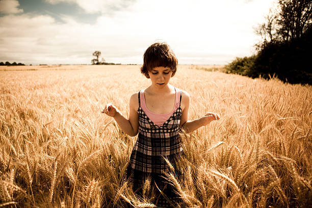 istock Wheat field standing woman 105779012