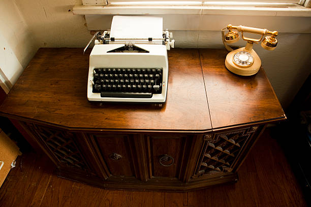 istock Old stereo console, typewriter and telephone 105779176