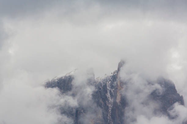 istock Dramatic cloudscape and rain clouds in the Dolomite Mountains, Italy 1057800316