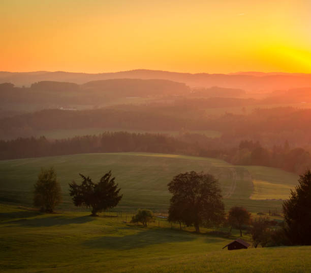 istock Nice sunset on hills with trees, Czech landscape 1057800388