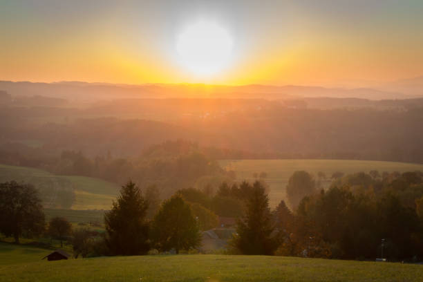 istock Nice sunset on hills with meadow and trees, Czech landscape 1057800390