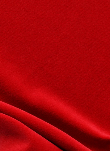 red velvet texture background. Christmas festive baskground. expensive luxury, fabric, material, needlework, sewing, wallpaper, cloth.Copy space