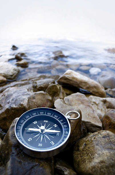 compass on the coast stock photo