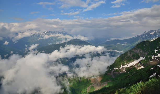 istock Caucasian mountains in early spring. view from above 1057811058