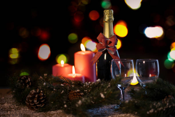 istock Two glasses and champagne bottle on table 1057818350