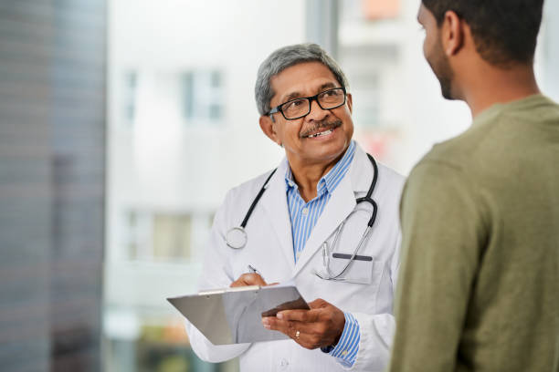 istock Using his expertise to assess the medical situation 1057818490
