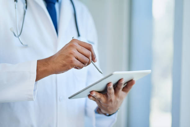 istock Staying updated with patient records 1057818592