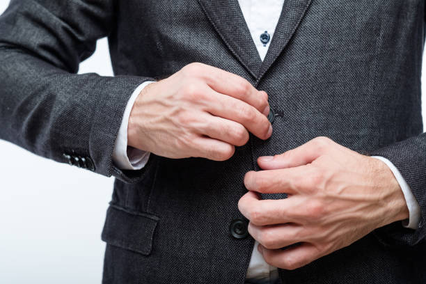 istock business man button suit jacket success confidence 1057824430