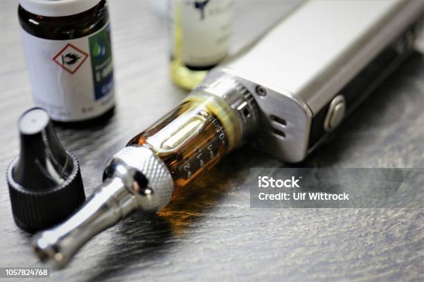 An Image Of A E Cigaette Stock Photo - Download Image Now - Electronic Cigarette, Pen, Condensation