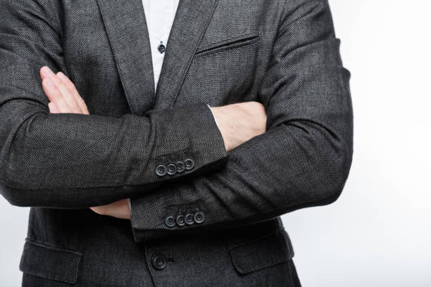 istock man crossed arms business trainer entrepreneur 1057826144