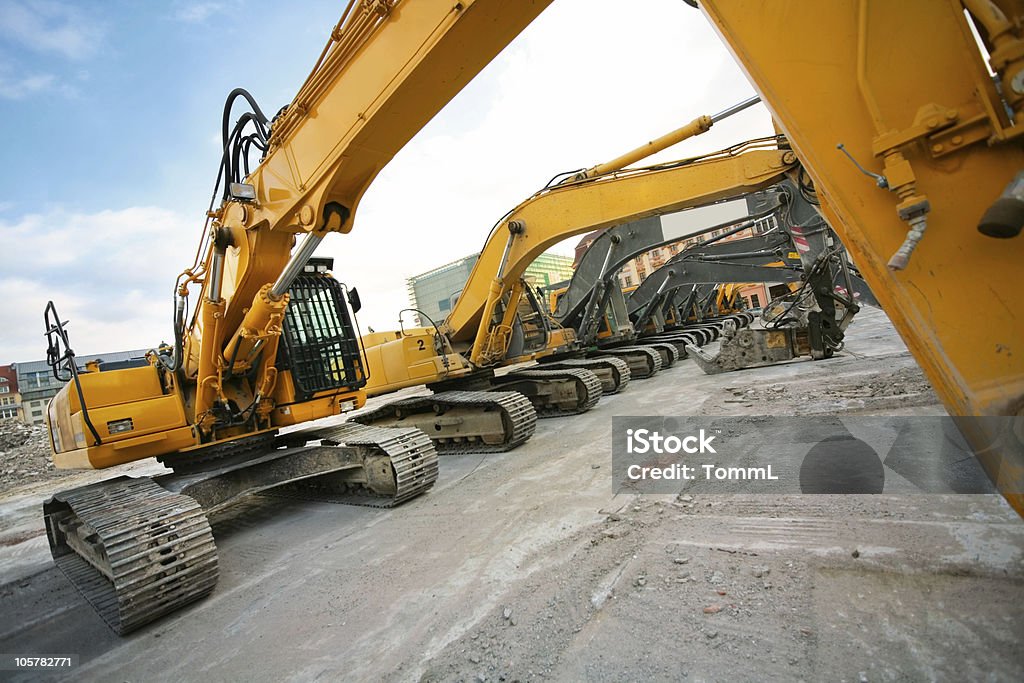 Excavadoras en una fila - Foto de stock de Pesado libre de derechos