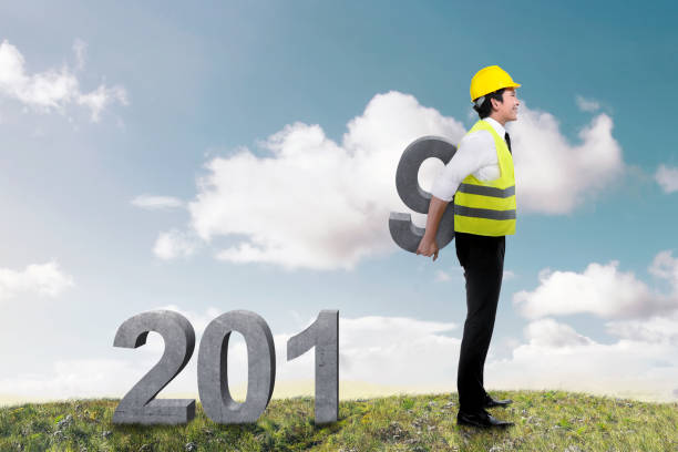 istock Young asian male construction workers carrying 9 to create 2019 1057828644