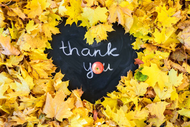 istock Blackboard with frame of leaves 1057832430