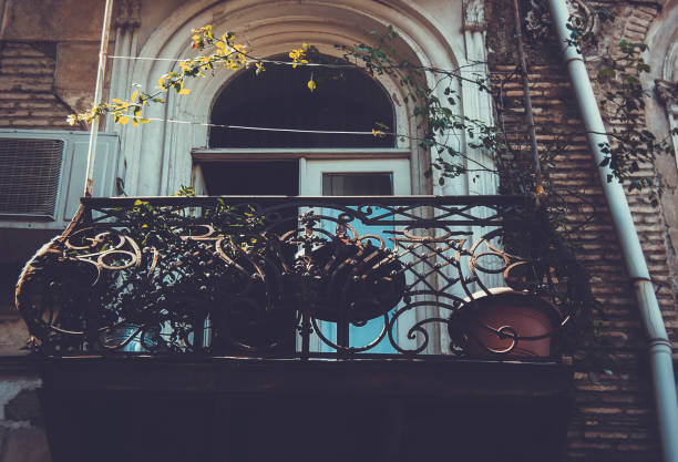 istock Old Tbilisi architecture, window and exterior decor in summer day 1057834574