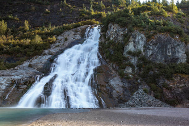 istock Waterfall near Mendenhall glacier,  Juneau Alaska 1057838970