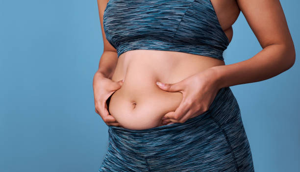 Free Photo  Vertical shot of unrecognizable woman has abdominal