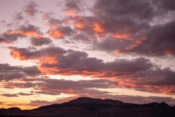 istock Mojave desert valley, mountain range, cloudy skies 1057840816