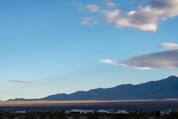 istock Mojave desert valley, mountain range, cloudy skies 1057850864