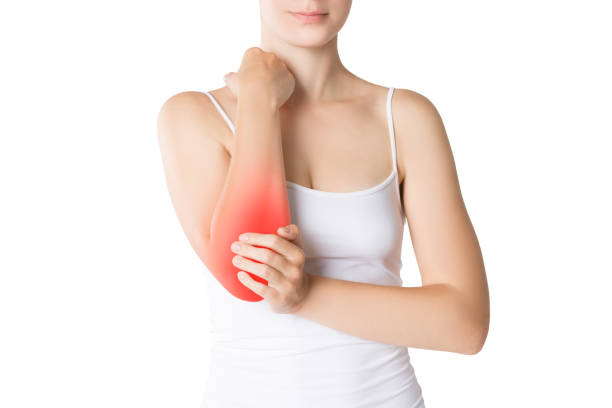 istock Woman with pain in elbow, joint inflammation 1057851108