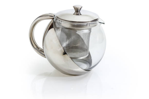 istock Empty stainless steel and glass teapot with strainer 1057851114