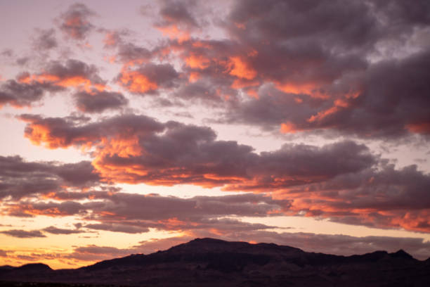 istock Mojave desert valley, mountain range, cloudy skies 1057851944