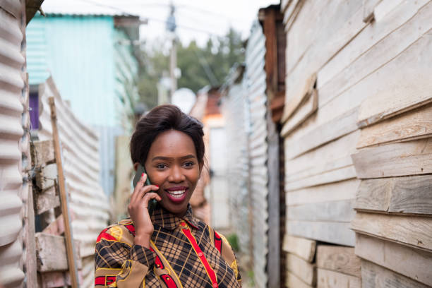 istock Young African woman using her mobile phone 1057856342