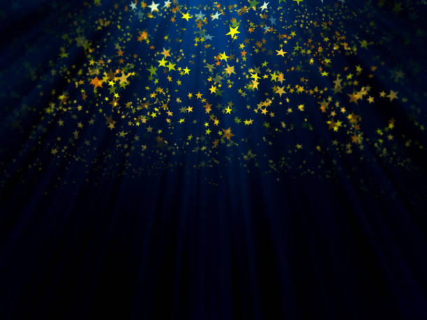 istock Falling golden confetti stars on black background 1057875612