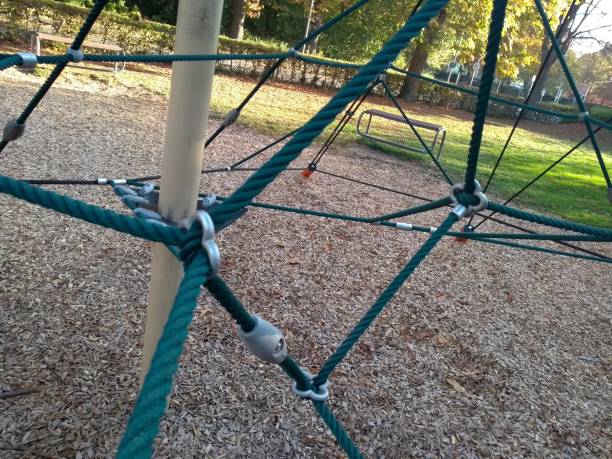 istock Blue rope climbing equipment playground 1057875806