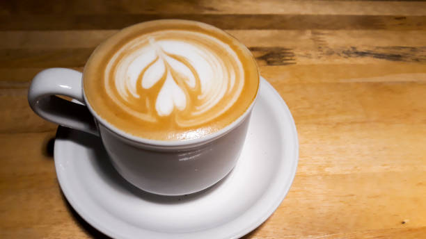 istock Close up shot coffee cup latte art 1057876290