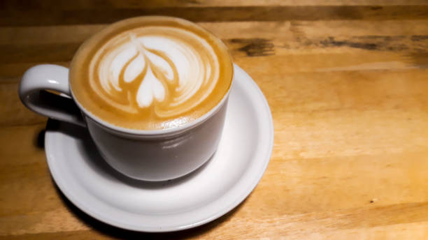 istock Close up shot coffee cup latte art 1057876292