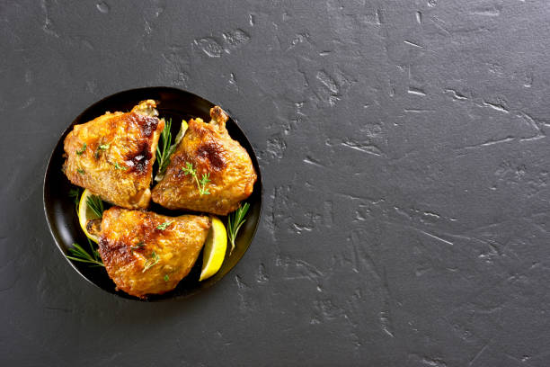 istock Baked chicken thighs 1057877058