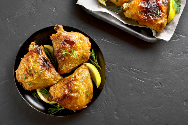 istock Baked chicken thighs 1057877094