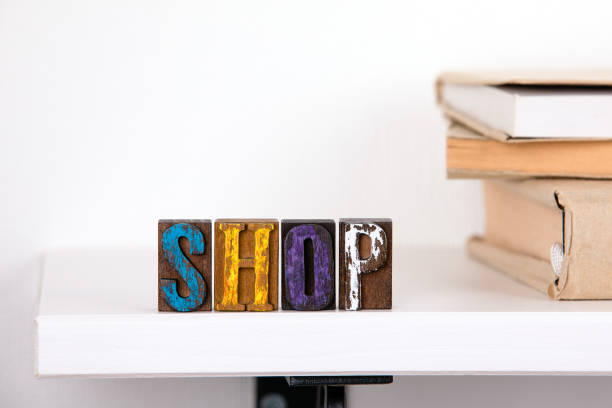 istock Shop word from colored wooden letters 1057881342