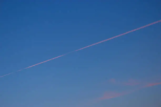 Chemical trail from airline fuel in the sky over Thailand.