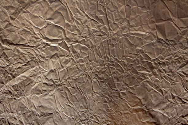 istock High detailed abstract packaging Yellow Wrinkled paper texture. 1057885866