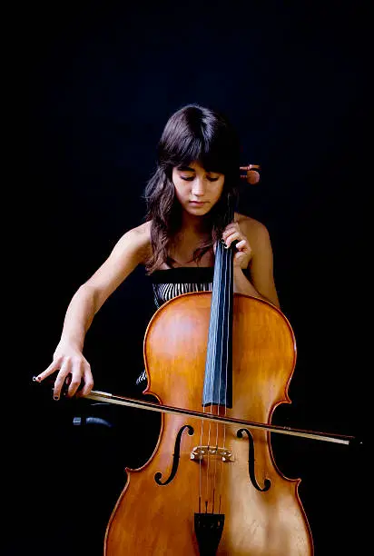 Photo of Teenage girl playing cello