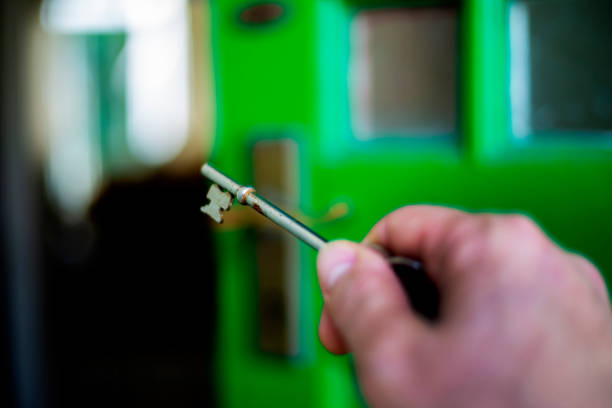 istock Key unlockes green door 1057889458
