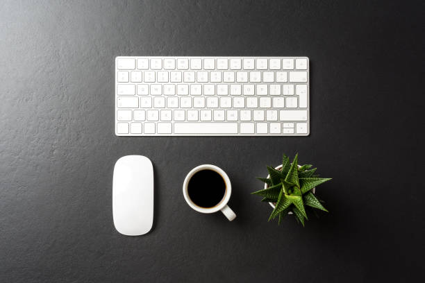 istock Overhead shot of modern office desktop 1057890076