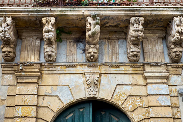 istock masks on Sicilian balcony 1057892406