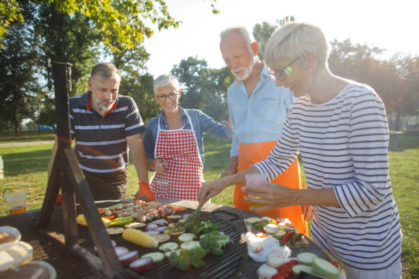 istock Senior people having a picnic 1057892466