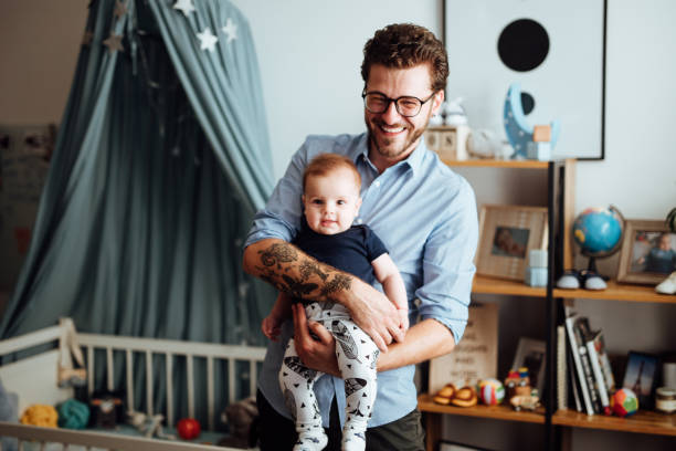 istock Parents embracing their baby boy 1057892484