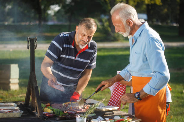 istock Senior men having a picnic 1057892596