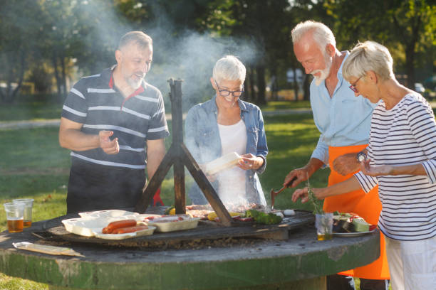 istock Senior people having a picnic 1057894312