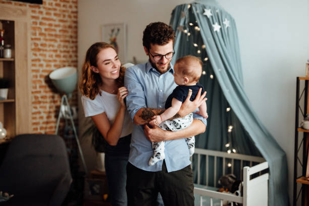 istock Parents playing hide and seek with their baby boy 1057894466
