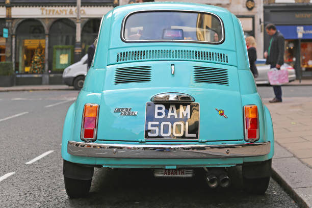 Fiat 500 Abarth Original London, United Kingdom - November 21, 2013: Classic Car Fiat 500 Abarth Original at Bond Street in London, UK. little fiat car stock pictures, royalty-free photos & images